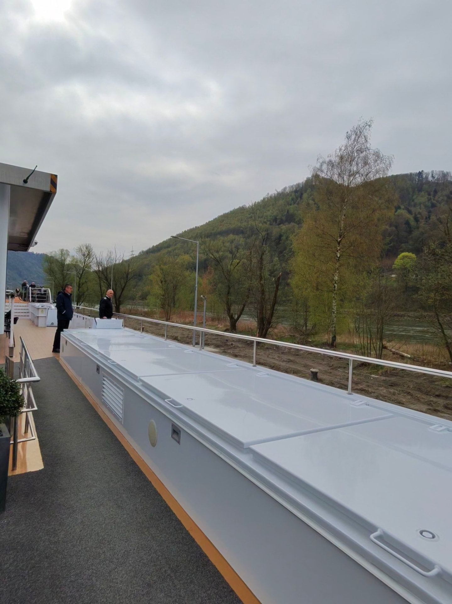A changing gangway and riverside docking area viewed from an Avalon river cruise ship